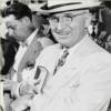 President Truman lifting his cuff to show his Gallet Flight Officer watch.
